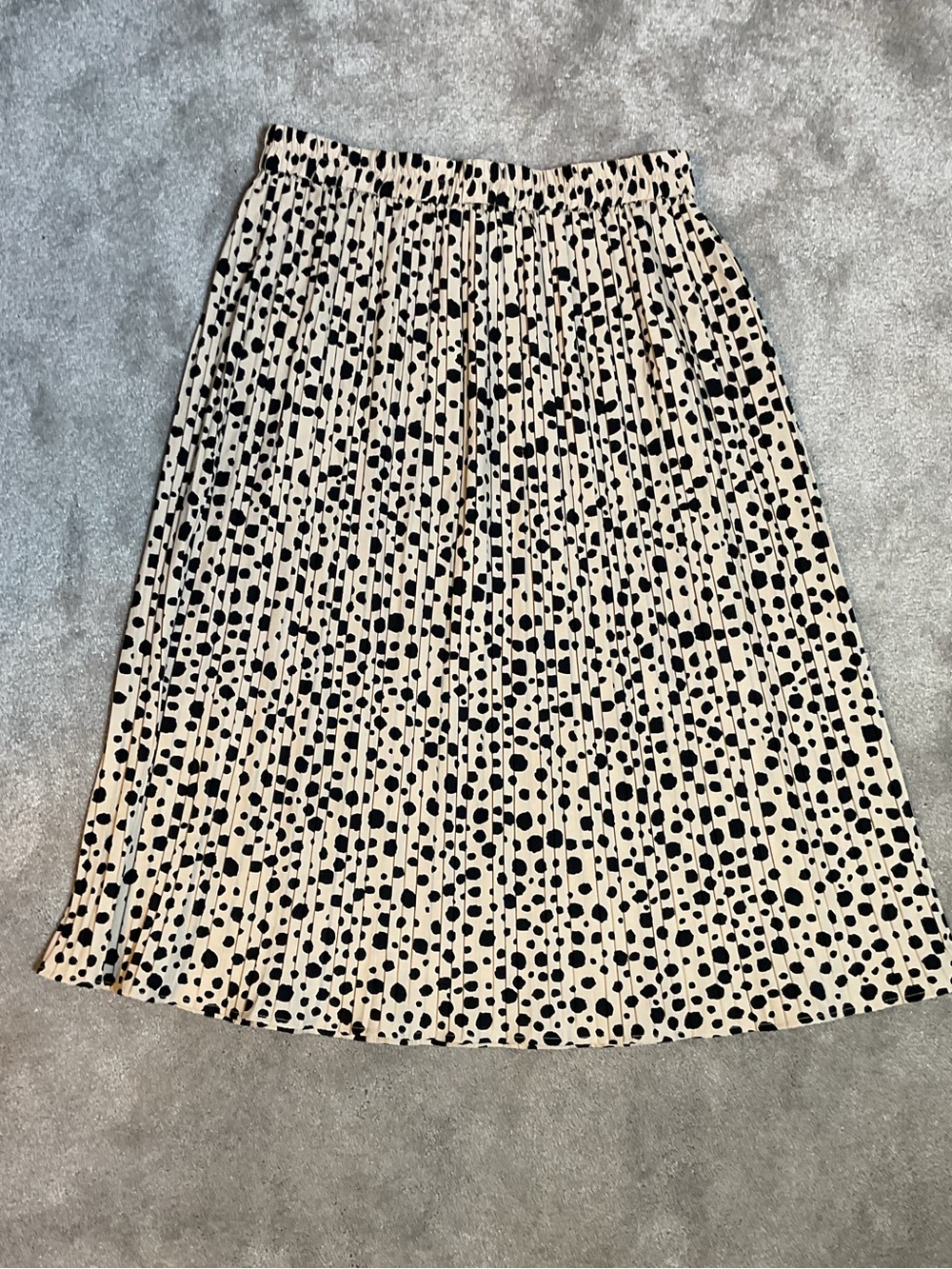 Sweet Rain Black Polka Dot Pleated Midi Skirt on Cream